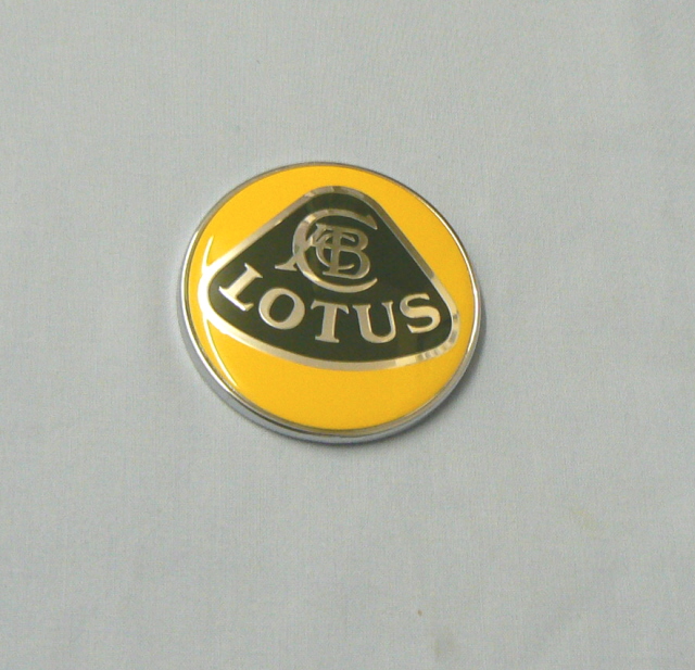 B117U0346F (117U0346) ROUND LOTUS BADGE on REAR PANEL (Only used prior ...